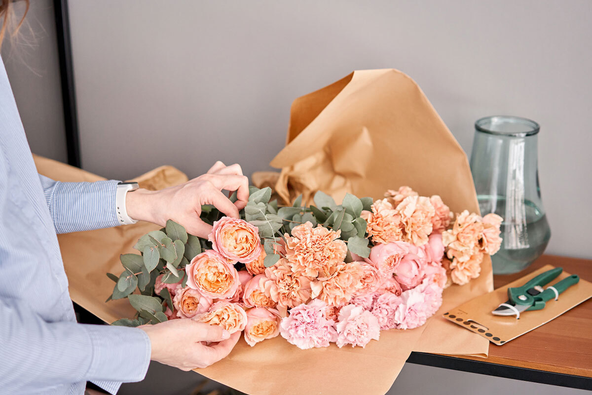 Florist preparing bouquet for pickup