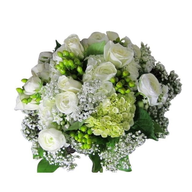 Soft floral arrangement featuring white roses and hydrangeas accented with greenery and delicate filler flowers.